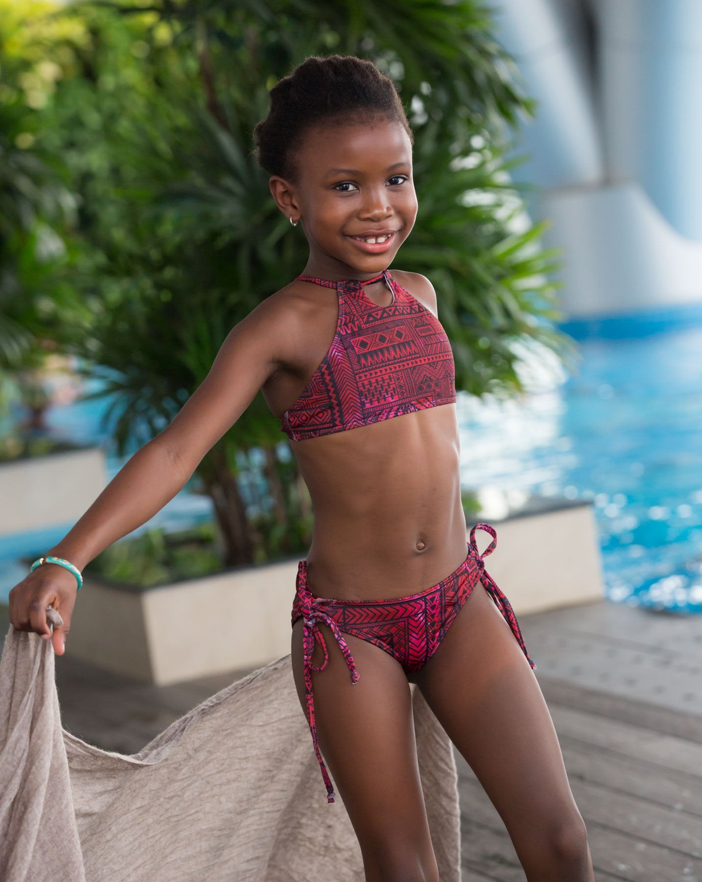 Girl wearing a Red Black 2-piece Full Coverage Bikini