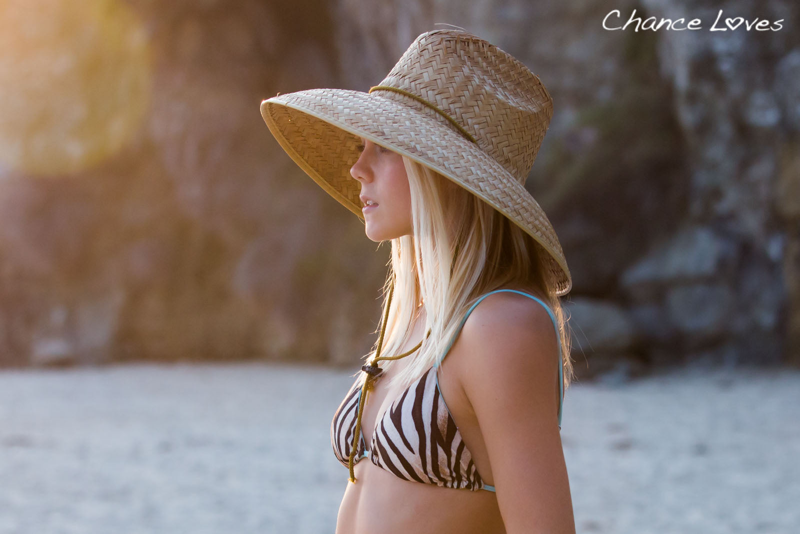 Wearing a beach hat matched with a swim top