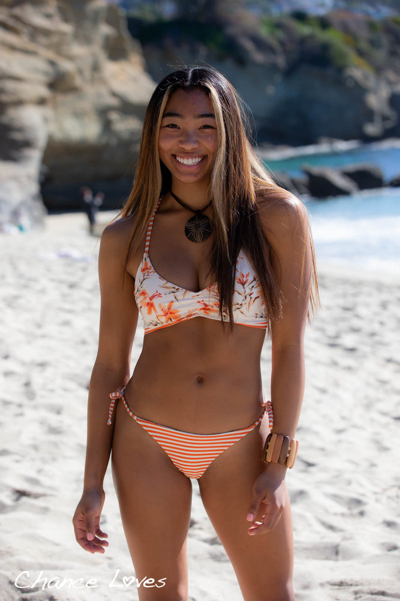 Orange white Cheeky style swim bottoms reversible with side ties adjustable