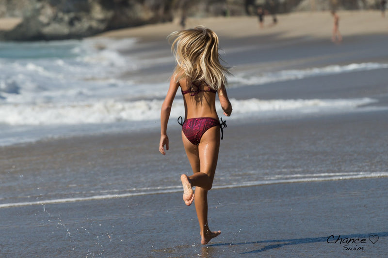 Sprinting at the beach in Bikini with Halter Top by Chance Loves Swimwear