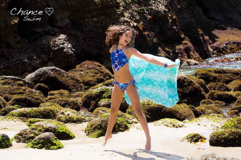 Dancing on the beach in the Blue Lagoon Tankini with Handkerchief Style Top - Chance Loves Swimwear