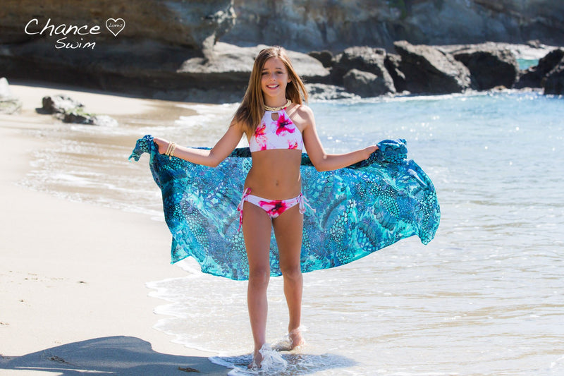 Girl walking on the beach in the Costa Flora Girls Tankini - Chance Loves Swimwear