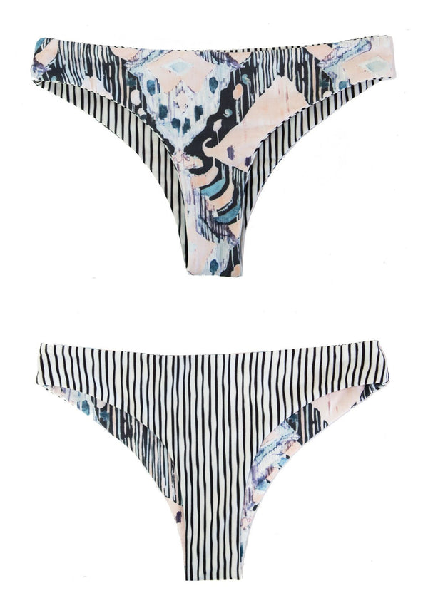 Reversible Bikini Bottoms with a striped pattern on one side, and a beautiful art print on the other side.