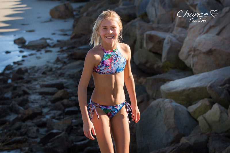 Young Chance Colette smiling in her 2-Piece Laguna Art Bikini design